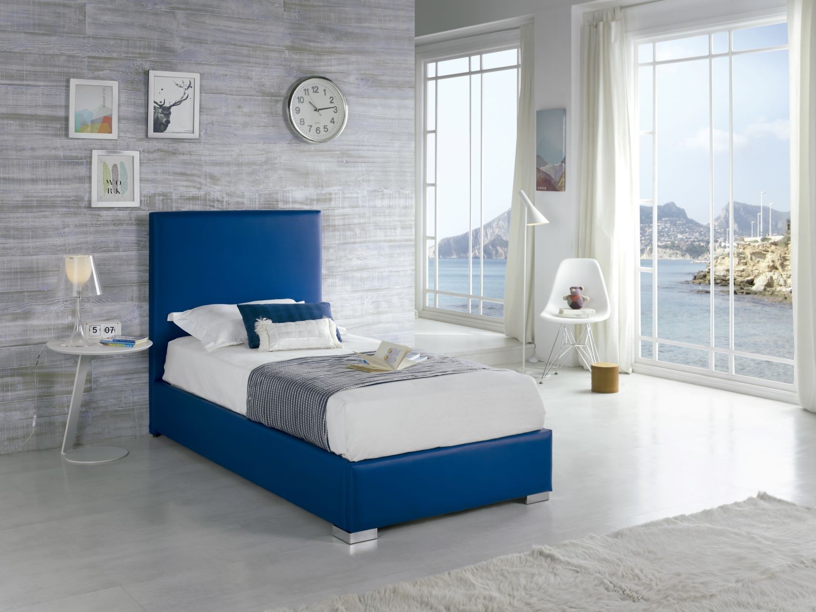 Levně Estila Moderní kožená postel Piccolo s modrým potahem 90-105cm