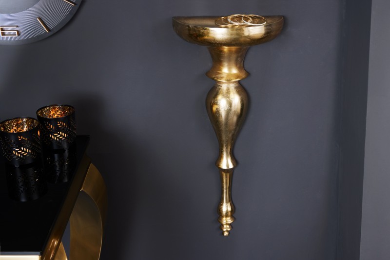 Levně Estila Luxusní antická nástěnná konzola Persephone ve zlatém provedení z kovu s ozdobnou konstrukcí 25cm