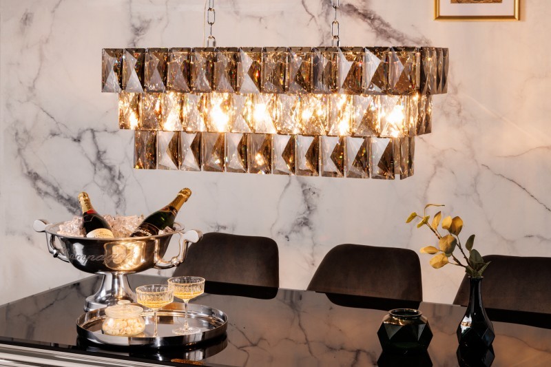 Levně Estila Luxusní závěsná lampa Leontin z kovu a křišťálu stříbrné barvy 127cm