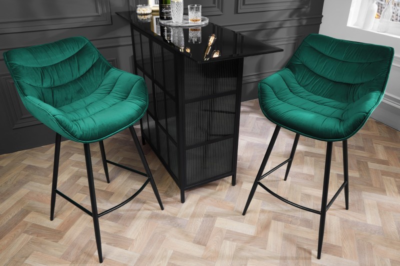 Levně Estila Designová moderní barová židle Kotor se smaragdově zeleným sametovým čalouněním a černýma nohama z kovu 105cm