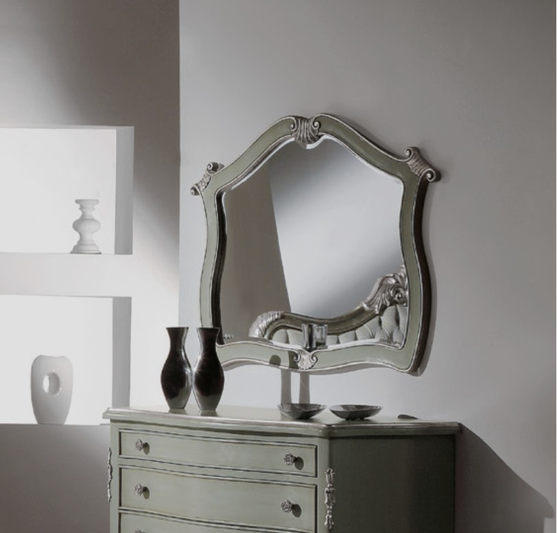 Levně Estila Rustikální nástěnné zrcadlo Soraya s dřevěným vyřezávaným rámem 120cm