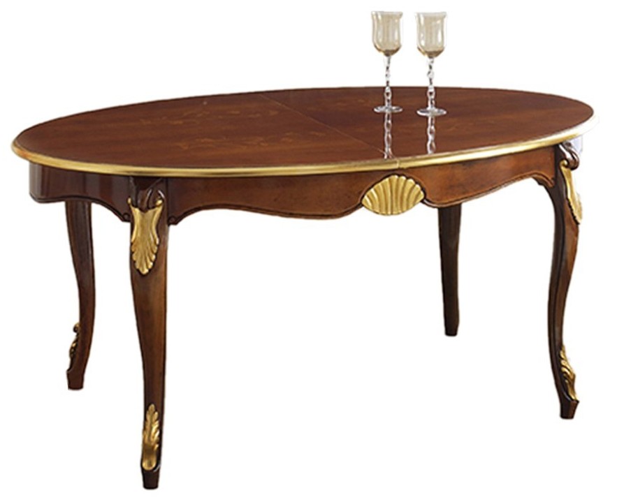 Estila Luxusní rustikální oválný jídelní stůl Pasiones z vyřezávaného masivu s kovovou výzdobou 170 cm