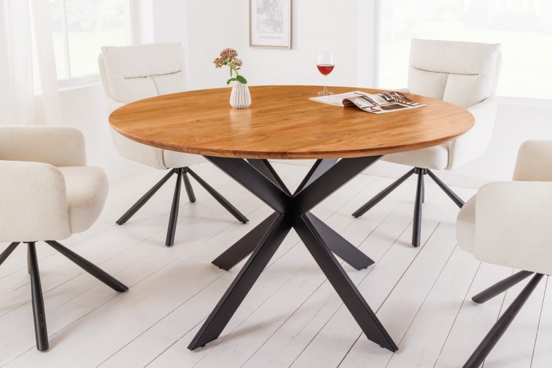 Estila Industriální jídelní stůl Comedor kulatého tvaru z masivního akáciového dřeva s kovovýma nohama 130cm