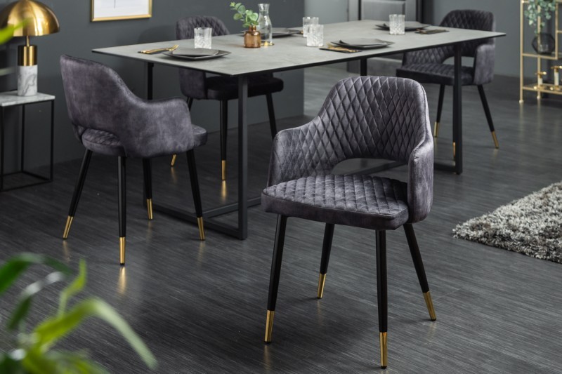 Estila Art-deco židle Fribourg se sametovým potahem šedé barvy a černo-zlatými nohama