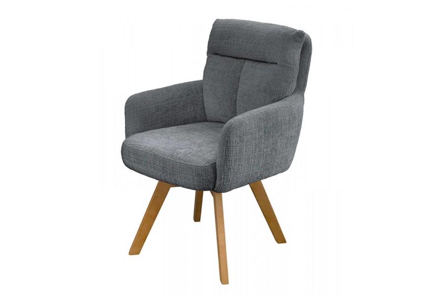 Designové skandinávské otočné jídelní křeslo Dover s žinylkovým potahem v šedé barvě se sametovým leskem s čalouněným opěrkovým polštářem s prošíváním ve tvaru T s hnědými šikmými nožičkami z bukového dřeva