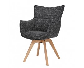 Modern&iacute; skandin&aacute;vsk&eacute; otočn&eacute; j&iacute;deln&iacute; křeslo Krespa s čalouněn&iacute;m v antracitov&eacute; &scaron;ed&eacute; barvě s mel&iacute;rovan&yacute;m vzorem se &scaron;ikm&yacute;ma nohama z dubov&eacute;ho dřeva v natur&aacute;ln&iacute; světle hněd&eacute; barvě