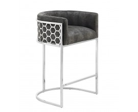 Glamour barová židle Arienda s šedým sametovým potahem a chromovou konstrukcí se šestiúhelníkovým vzorem medového plastu