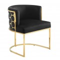 Art deco křeslo Leara se sametovým potahem v černé barvě s konstrukcí ve zlaté barvě s lesklým zlatým povrchem se vzorem medového plátu