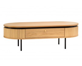 Designov&yacute; modern&iacute; konferenčn&iacute; stolek Maderia s &uacute;ložn&yacute;m prostorem ve dvou z&aacute;suvk&aacute;ch s ov&aacute;lnou vrchn&iacute; deskou a ozdobn&yacute;m vertik&aacute;ln&iacute;m dr&aacute;žkov&aacute;n&iacute;m z dubov&eacute; d&yacute;hy ve světle hněd&eacute; barvě s čern&yacute;mi kovov&yacute;mi nohami