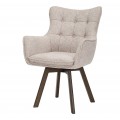 Moderní designová otočná jídelní židle Herold v béžové barvě s čalouněnou zádovou s prošíváním s kulatými knoflíčky opěrkou s opěrkami na ruce s nožičkami z dubového dřeva v tmavě hnědé barvě