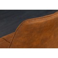 Designov&aacute; industri&aacute;ln&iacute; j&iacute;deln&iacute; židle Moritz s koňakově hněd&yacute;m potahem z mikrovl&aacute;kna a čern&yacute;mi kovov&yacute;mi nohami 51 cm