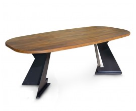Luxusní designový masivní jídelní stůl Treviso s oválnou vrchní deskou z mangového dřeva v naturální medové hnědé barvě s výraznou kresbou letokruhů se dvěma nohama z kovu v černé barvě s půdorysem ve tvaru V