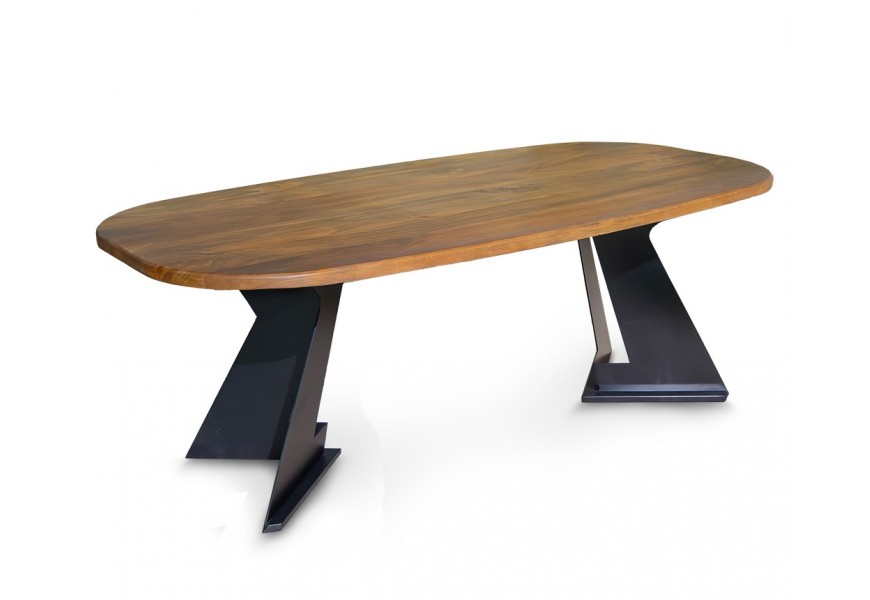 Luxusní designový masivní jídelní stůl Treviso s oválnou vrchní deskou z mangového dřeva v naturální medové hnědé barvě s výraznou kresbou letokruhů se dvěma nohama z kovu v černé barvě s půdorysem ve tvaru V