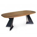 Luxusní designový masivní jídelní stůl Treviso s oválnou vrchní deskou z mangového dřeva v naturální medové hnědé barvě s výraznou kresbou letokruhů se dvěma nohama z kovu v černé barvě s půdorysem ve tvaru V