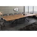 Moderní industriální jídelní stůl Gerant s obdélníkovou vrchní deskou s možností rozložení z ořechové dýhy v naturální hnědé barvě s přirozenou kresbou letokruhů s podstavou z kovu v matném černém provedení se čtyřmi nohama