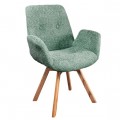 Designová jídelní židle Loris v zelené barvě s nízkými bočními opěrkami s bouclé potahem a dubovými nožičkami
