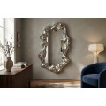Designov&eacute; art deco n&aacute;stěnn&eacute; zrcadlo Inger s atypick&yacute;m trojrozměrn&yacute;m r&aacute;mem ve stř&iacute;brn&eacute; barvě 150 cm
