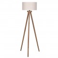 Masivní venkovská stojací lampa Ira se třemi nožičkami z mangového dřeva v hnědé barvě s válcovým kulatým stínítkem z bavlny v béžové barvě