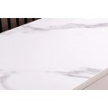 Designov&aacute; art deco b&iacute;l&aacute; komoda Savonia s mramorovou deskou a &scaron;esti &scaron;upl&iacute;ky s minimalistick&yacute;m reli&eacute;fem vlny 150 cm