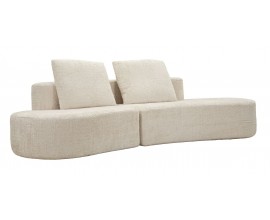 Designov&aacute; modern&iacute; čalouněn&aacute; čtyřm&iacute;stn&aacute; sedačka Lilio v atypick&eacute;m obl&eacute;m tvaru se dvěma čtvercov&yacute;mi pol&scaron;t&aacute;ři v kr&eacute;mov&eacute; b&iacute;l&eacute; barvě se semi&scaron;ov&yacute;m potahem bez bočn&iacute;ch opěrek