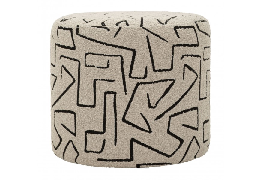 Designová čalouněná taburetka Terezja v kulatém tvaru v béžové hnědé barvě s textilním potahem s černým vyšívaným vzorem v geometrickém tvaru