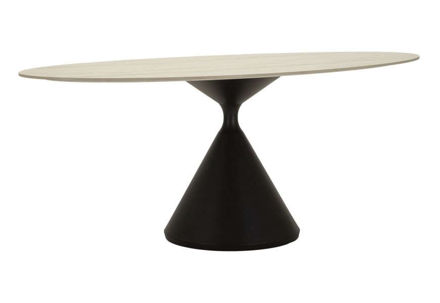 Moderní designový jídelní stůl Ferrera s oválnou vrchní deskou s designem béžového travertinu na jedné černé kovové noze ve tvaru přesýpacích hodin