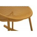 Designov&eacute; modern&iacute; houpac&iacute; křeslo Isola s kulatou sedac&iacute; č&aacute;st&iacute; s perforovan&yacute;m vzorem ve žlut&eacute; barvě 66 cm