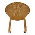 Designov&eacute; modern&iacute; houpac&iacute; křeslo Isola s kulatou sedac&iacute; č&aacute;st&iacute; s perforovan&yacute;m vzorem ve žlut&eacute; barvě 66 cm