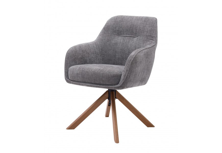 Moderní otočné šedé jídelní křeslo Egon s opěrkami na ruce s potahem se sametovým leskem se šikmým dubovým nohama v přírodní světlé hnědé barvě