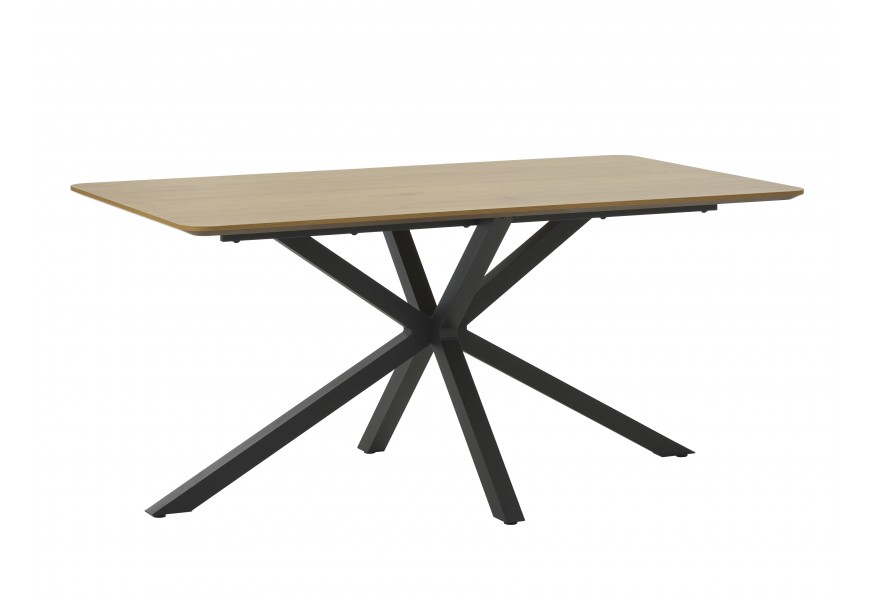Moderní industriální obdélníkový jídelní stůl s podstavou z kovu v matné černé barvě se čtyřmi nohama s překříženým designem a vrchní deskou z dýhy ve světlém hnědém dubovém provedení