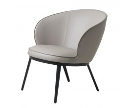 Designov&eacute; industri&aacute;ln&iacute; kulat&eacute; křeslo Gamla se zaoblenou z&aacute;dovou opěrkou s vytažen&yacute;mi bočnicemi a potahem z ekokůže v odst&iacute;nu taupě v t&oacute;nech hněd&eacute; a &scaron;ed&eacute; s podstavou z kovu v čern&eacute; barvě se čtyřmi &scaron;t&iacute;hl&yacute;ma nohama