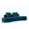Designov&aacute; obl&aacute; čtyřm&iacute;stn&aacute; sedačka Lilos v tmavě modr&eacute; barvě s ply&scaron;ov&yacute;m potahem v organick&eacute;m tvaru 238 cm