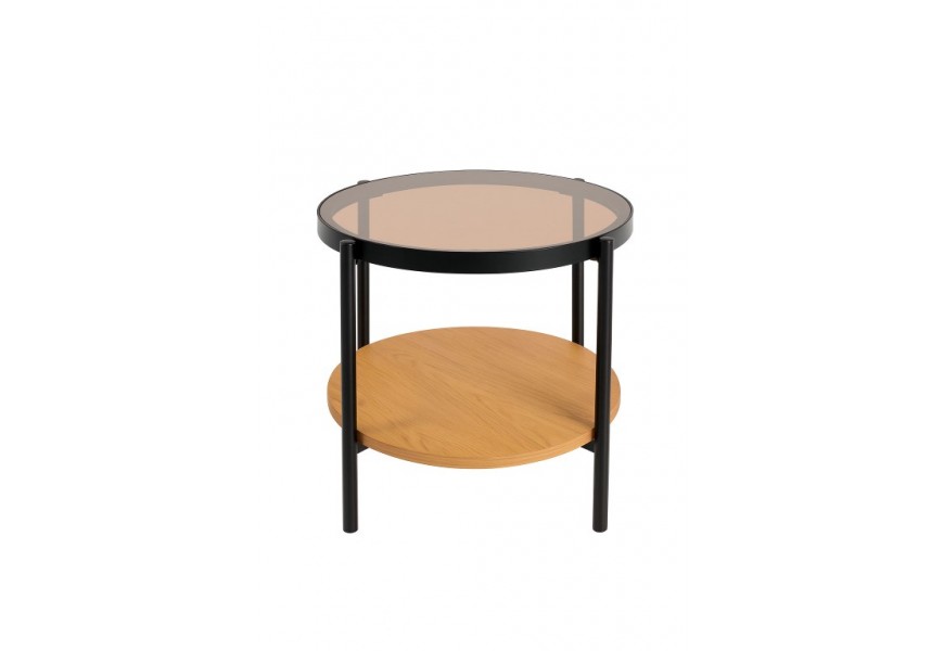 Industriální příruční stolek Sonny s kulatou deskou s tónovaného hnědého bezpečnostního skla s melaminovou policí ve světlém hnědém dubovém provedení s konstrukcí z kovu v matné černé barvě se čtyřmi nohama