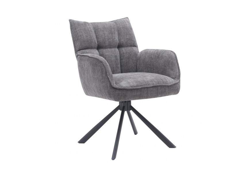 Moderní otočné jídelní křeslo Laerke s opěrkami na ruce prošívaným obdélníkovým vzorem s žinylkovým potahem se sametovým leskem v šedé barvě s podstavou z kovu v černé barvě se čtyřmi šikmýma nohama