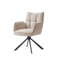 Moderní skandinávská krémová jídelní židle v odstínu lnu s otočnou sedací částí s žinylkovým potahem s prošíváním s obdélníkovým vzorem na opěrce s bočními opěrkami na ruce s podstavou z kovu v černé barvě se čtyřmi šikmými rameny