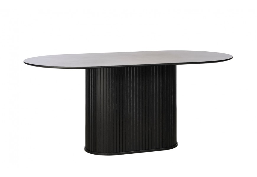 Retro oválný jídelní stůl Bornholm v černém dubovém provedení s přiznanou kresbou dřeva s hladkou vrchní deskou a válcovitou nohou s vertikálním lamelovým obkladem