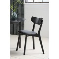 Modern&iacute; masivn&iacute; čern&aacute; j&iacute;deln&iacute; židle Vitro s dubovou konstrukc&iacute; a čalouněn&yacute;m sedadlem kožen&yacute;m potahem 82 cm