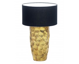 Luxusn&iacute; art-deco stoln&iacute; lampa Almina se zlat&yacute;m hlin&iacute;kov&yacute;m podstavcem s klad&iacute;vkov&yacute;m efektem a čern&yacute;m textiln&iacute;m st&iacute;n&iacute;tkem 53 cm