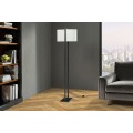 Modern&iacute; stojac&iacute; lampa Ambient s ov&aacute;ln&yacute;m b&eacute;žov&yacute;m textiln&iacute;m st&iacute;n&iacute;tkem a černou kovovou konstrukc&iacute; s podstavcem 160 cm