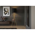 Modern&iacute; glamour stojac&iacute; lampa Mervik se zlatou trojitou konstrukc&iacute; s odkl&aacute;dac&iacute;m prostorem a tmav&yacute;m st&iacute;n&iacute;tkem 175 cm