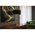Designov&aacute; glamour stoln&iacute; lampa Tierra Glam se zlatou kovovou podstavou s figurou kobry a čern&yacute;m textiln&iacute;m st&iacute;n&iacute;tkem 110 cm