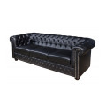 Modern&iacute; luxusn&iacute; ob&yacute;vac&iacute; sestava Chesterfield s klasick&yacute;m n&aacute;dechem v čern&eacute;m kožen&eacute;m proveden&iacute;