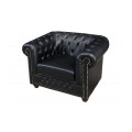 Modern&iacute; luxusn&iacute; ob&yacute;vac&iacute; sestava Chesterfield s klasick&yacute;m n&aacute;dechem v čern&eacute;m kožen&eacute;m proveden&iacute;