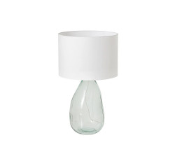 Modern&iacute; skleněn&aacute; lampa Glassy s atypickou podstavou s průhledn&eacute;ho bezpečnostn&iacute;ho skla s asymetrickou siluetou s b&iacute;l&yacute;m kulat&yacute;m textiln&iacute;m st&iacute;n&iacute;tkem