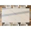 Modern&iacute; obd&eacute;ln&iacute;kov&yacute; j&iacute;deln&iacute; stůl Ceramia Blanca s keramickou deskou v designu b&iacute;l&eacute;ho mramoru s překř&iacute;žen&yacute;ma nohama 180 cm