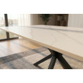 Modern&iacute; obd&eacute;ln&iacute;kov&yacute; j&iacute;deln&iacute; stůl Ceramia Blanca s keramickou deskou v designu b&iacute;l&eacute;ho mramoru s překř&iacute;žen&yacute;ma nohama 180 cm