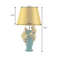 Designov&aacute; art deco stoln&iacute; lampa Tierra Glam ve zlat&eacute; a zelen&eacute; barvě s dekorem pěti figur chameleonů 54 cm