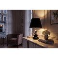 Art deco modern&iacute; stoln&iacute; lampa Caillou s podstavou s designem obl&aacute;zků v čern&eacute; barvě se stř&iacute;brn&yacute;m detailem 45 cm