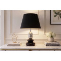 Art deco modern&iacute; stoln&iacute; lampa Caillou s podstavou s designem obl&aacute;zků v čern&eacute; barvě se stř&iacute;brn&yacute;m detailem 45 cm