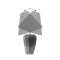 Modern&iacute; art deco b&iacute;l&aacute; stoln&iacute; lampa Caillou se zlat&yacute;m detailem s designem naskl&aacute;dan&yacute;ch kamenů a polohovateln&yacute;m st&iacute;n&iacute;tkem 68 cm